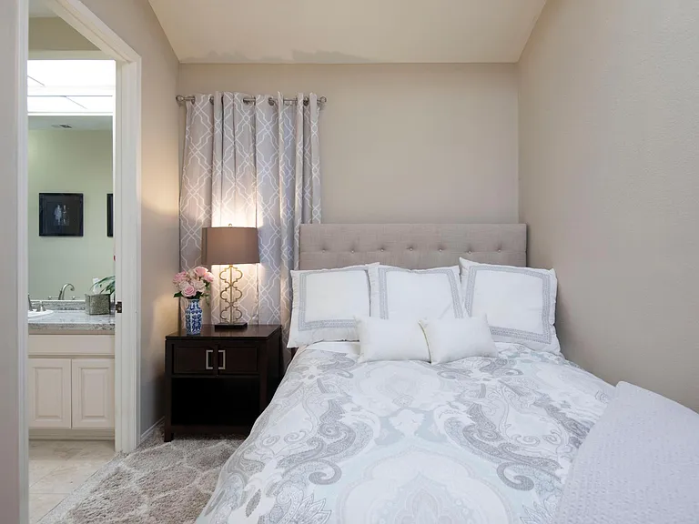 Guest Bedroom with en suite bathroom, walk in closet and queen size bed