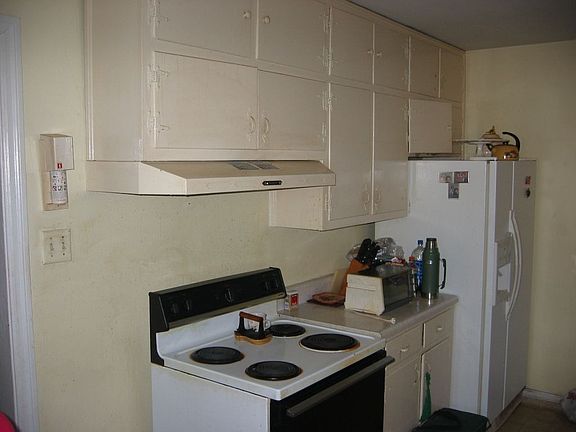 Kitchen has lots of cabinets