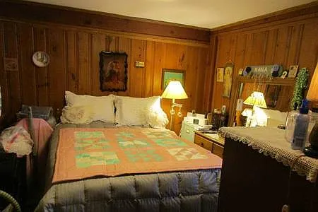 BEDROOM with closet and cabinet
