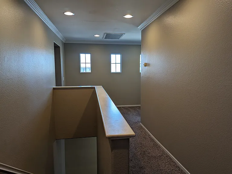 Hallway with area to put small office or seating