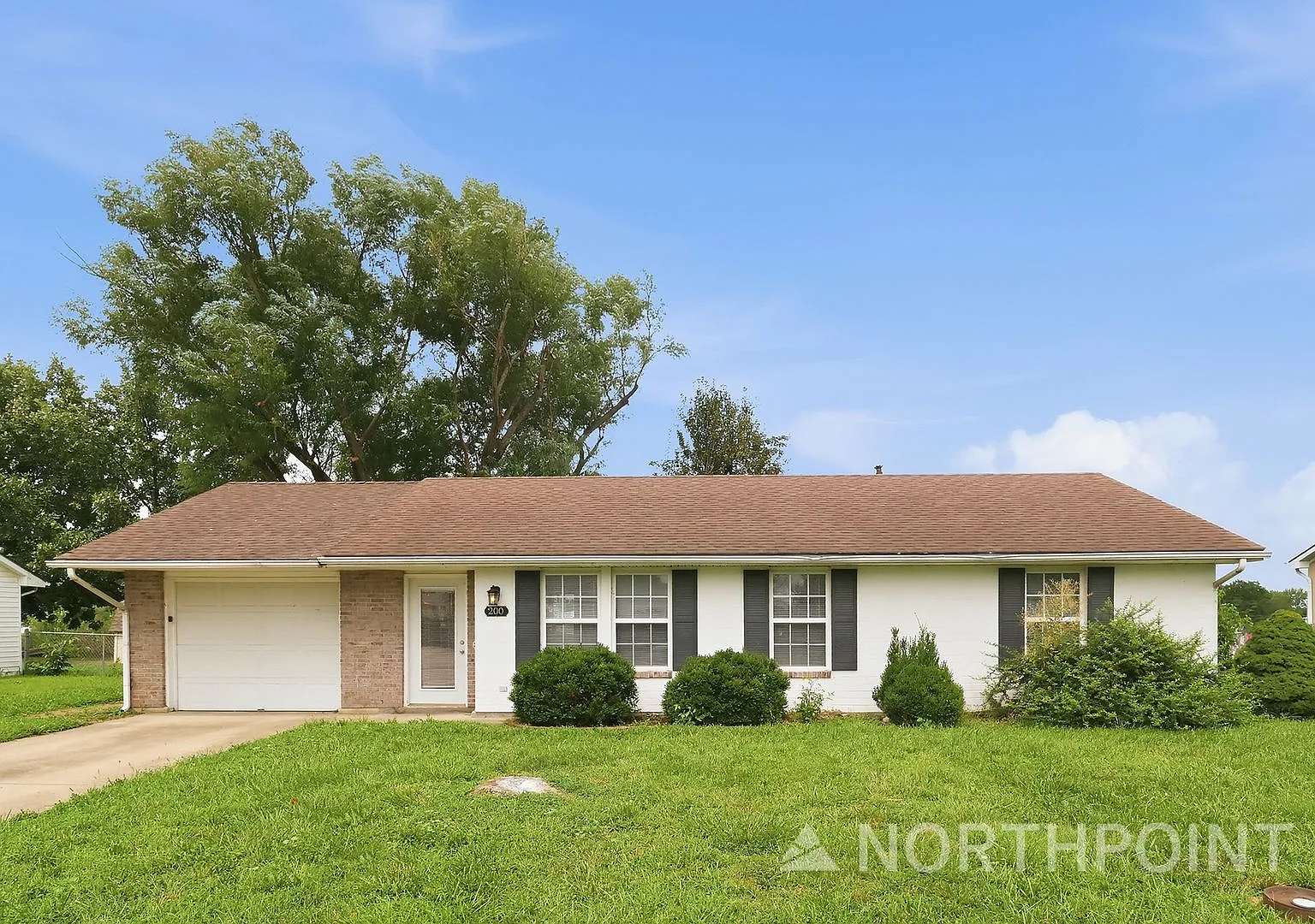 3-Bedroom, 1 Bath Single Family for Rent in Grain Valley, MO | Attached Garage & Modern Kitchen — Photo 1