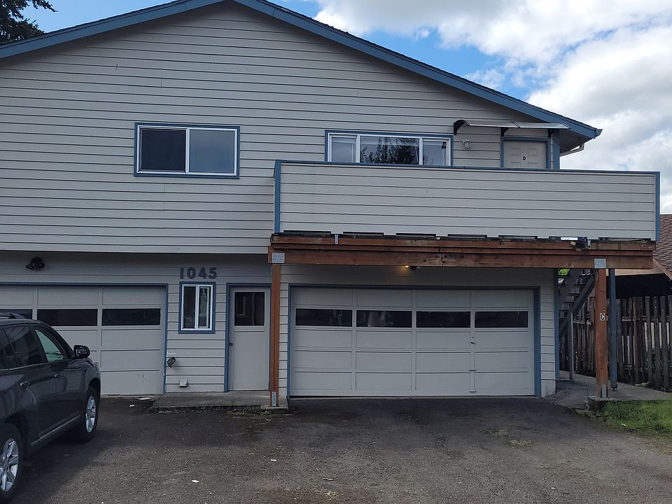 upstairs unit D goes across both garages and laundry room, assigned parking spaces will be in-front of garage door.