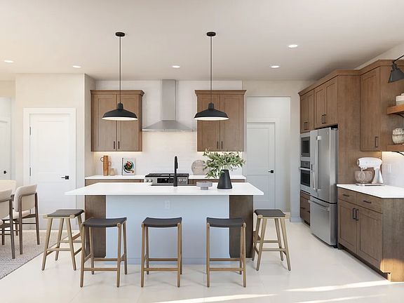 Kitchen with pendant lighting and floating shelves