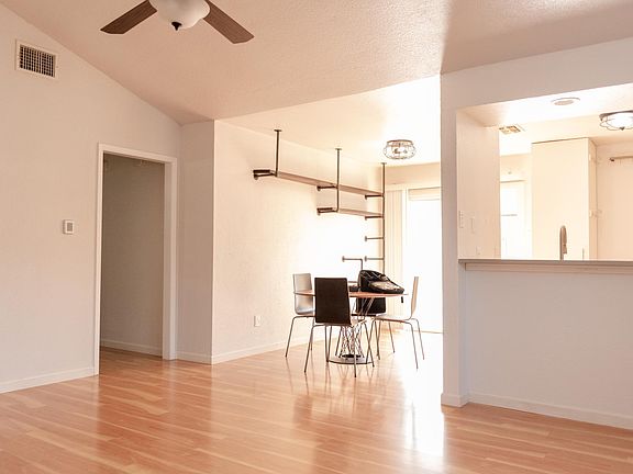 View from front door entrance. Kitchen and dining area. Kitchen table and chairs included upon request.
