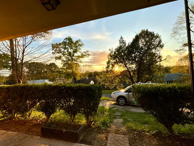 SUNSET VIEW FROM INSIDE FRONT AND PARKING PAD