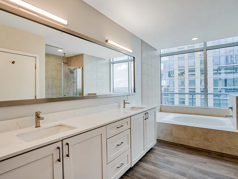 Our penthouse bathrooms are equipped with a double vanity and soaking tub