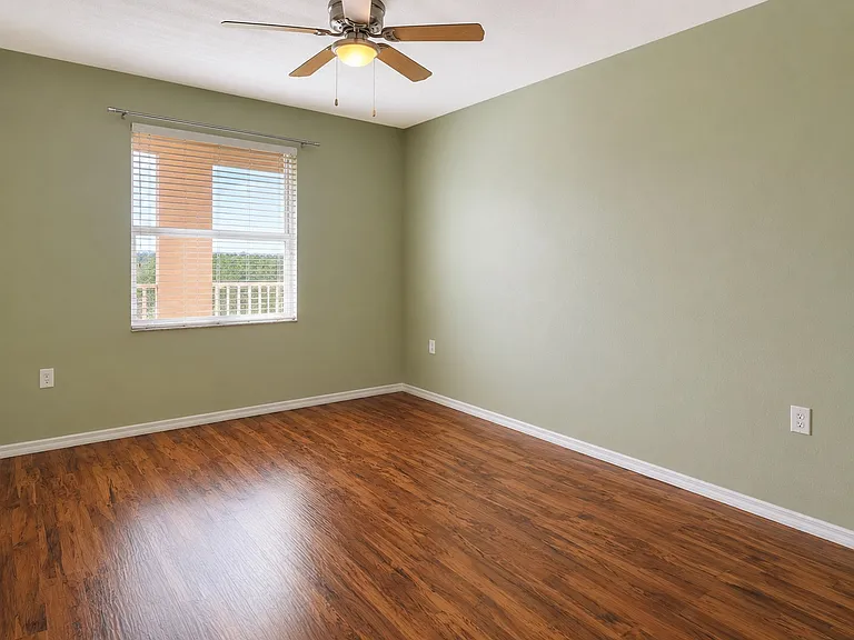 Spacious primary bedroom with walk-in closet and private en-suite bathroom