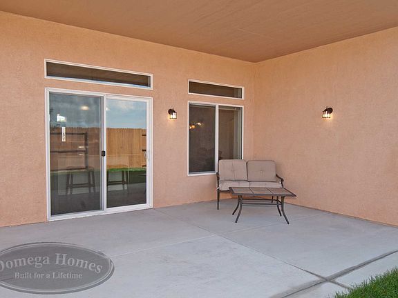 Model shown with upgrades optional 3 car garage extended patio with courtyard wall