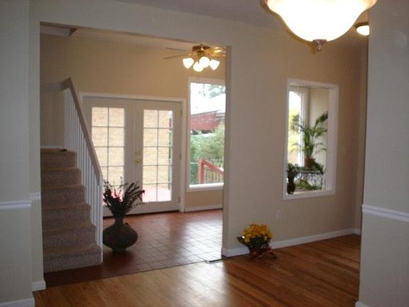 Gleaming hardwood floors, French doors, garden room with great southern and western light. Plant heaven!