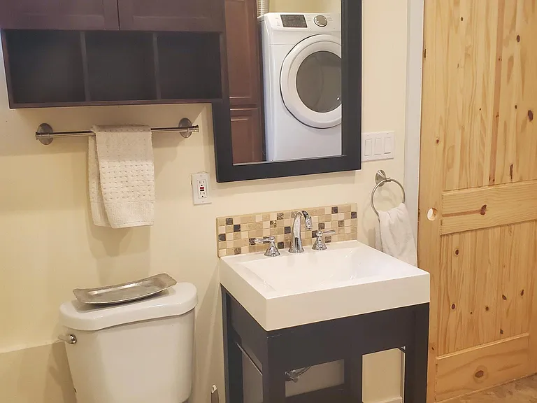 Bathroom with new vanity and fresh paint.