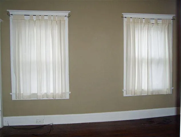 Mini blinds or curtains included. Double insulated glass wi