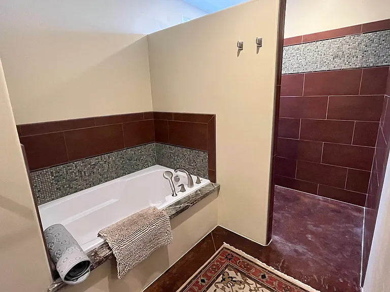 Master Suite 3 On-Suite Bathroom Soaking Tub with Walk-in Shower on the Right