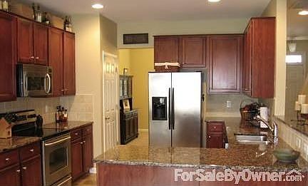 Kitchen with Granite Countertops
						:
						Stainless Steel Appliances