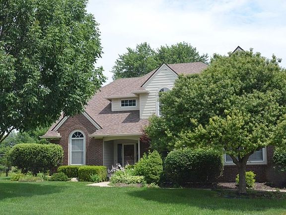 Mature trees provide a great setting for this home.
