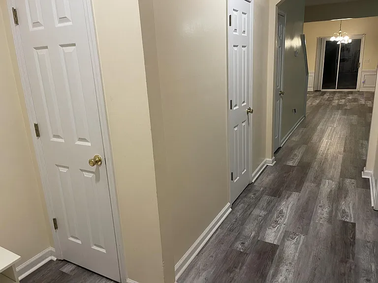 Main hallway with closet and 1/2 bath