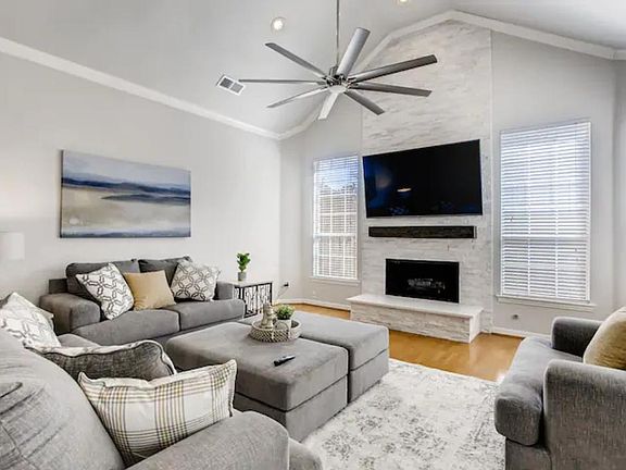 Main living room with 75" UHD Smart TV w/ Disney+ and Netflix