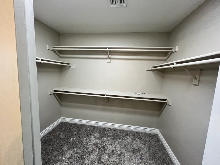 Generously sized walk-in closet in the primary suite