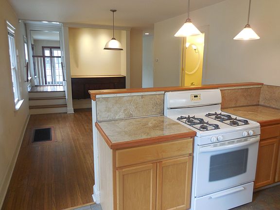 Kitchen/dining room/half bath facing east.