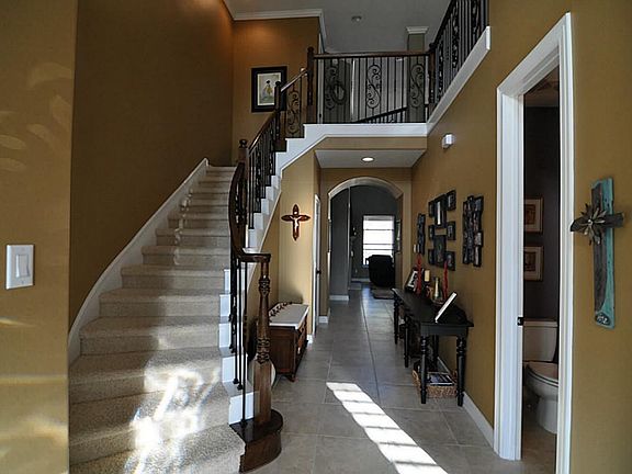 Entry: Spacious two story entry leads to study on the left, family room straight ahead, and dining r
