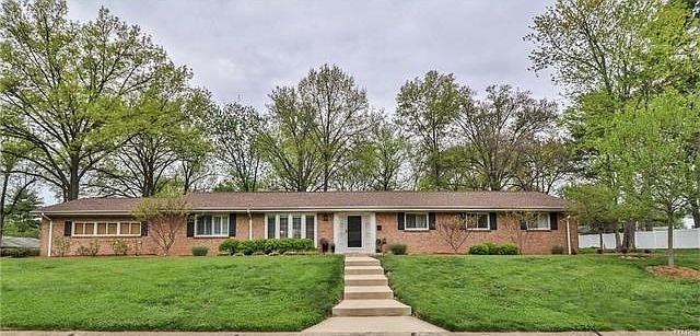 4 Bedroom / 2 bath brick ranch on almost an acre lot located in a quiet Kirkwood neighborhood