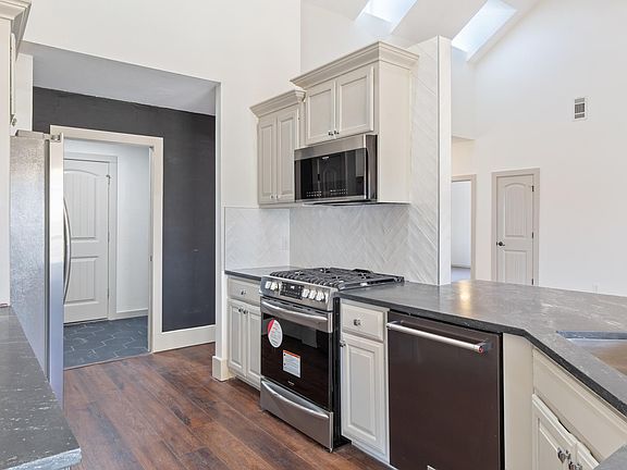 Kitchen View to Hallway and Mudroom/Laundry Room
