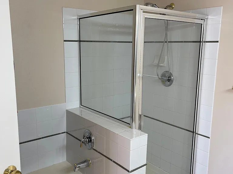 Bathtub and shower in master bathroom