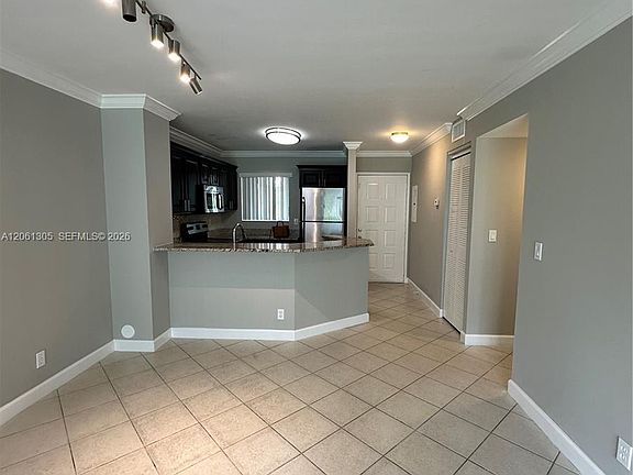 4th image of 8750 N Sherman Cir APT 103