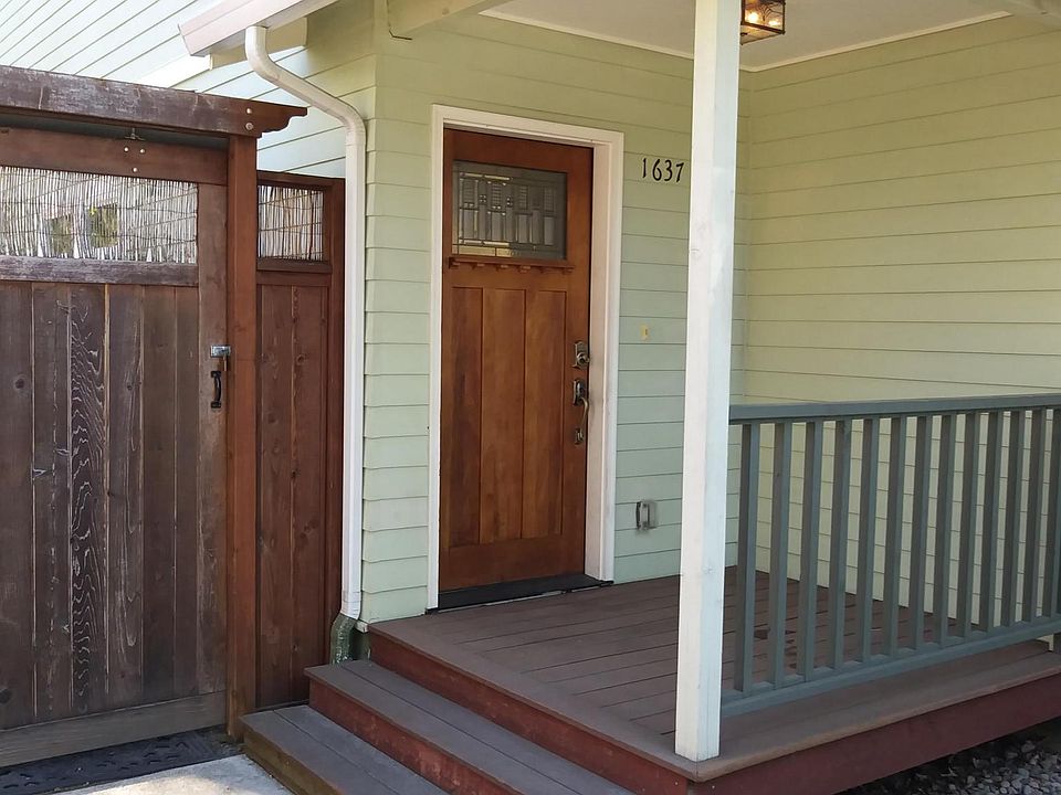 Front porch, locked gate to utility area and backyard. Eugen