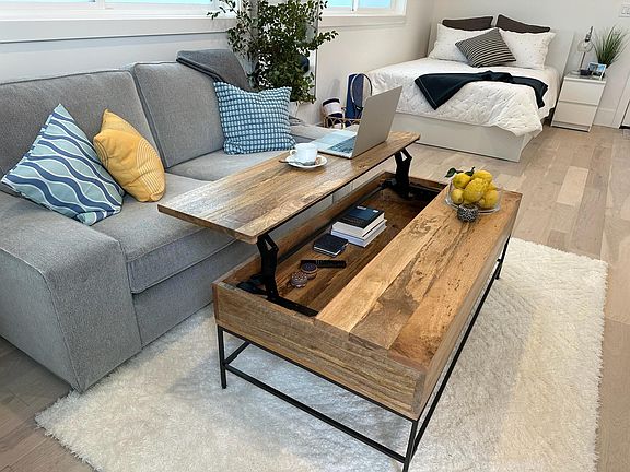 Lift-top coffee table w/ storage