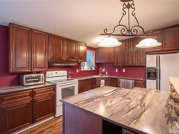 Beautifully updated kitchen, with ample counter space.