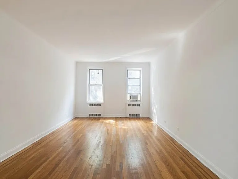 9216 Whitney Ave #203 — Photo 1