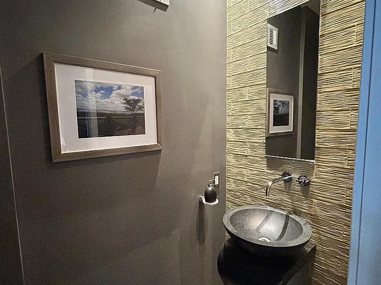 Half bath off kitchen - sink area