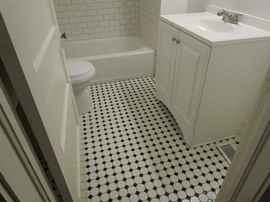 Second full bath off hallway next to guest room