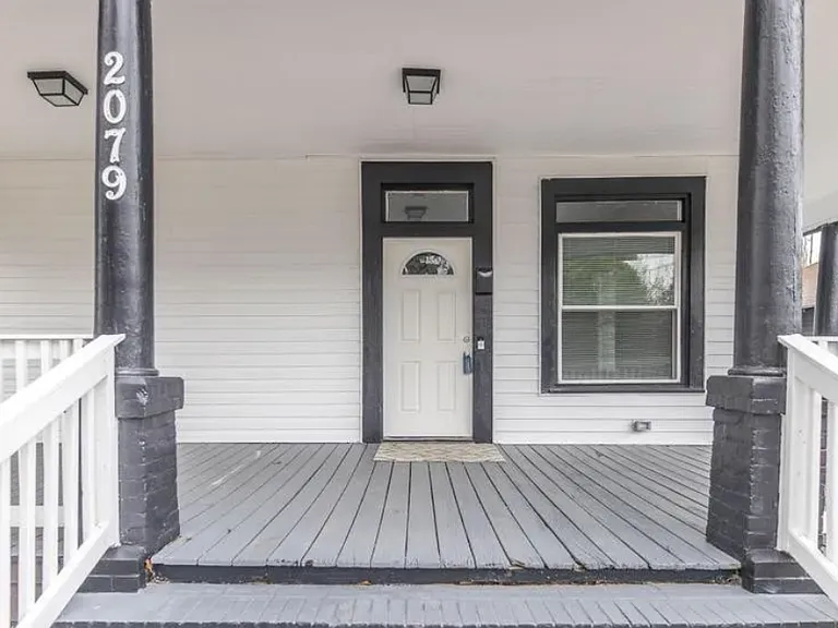 Welcome Home! Front entrance with wrap-around porch