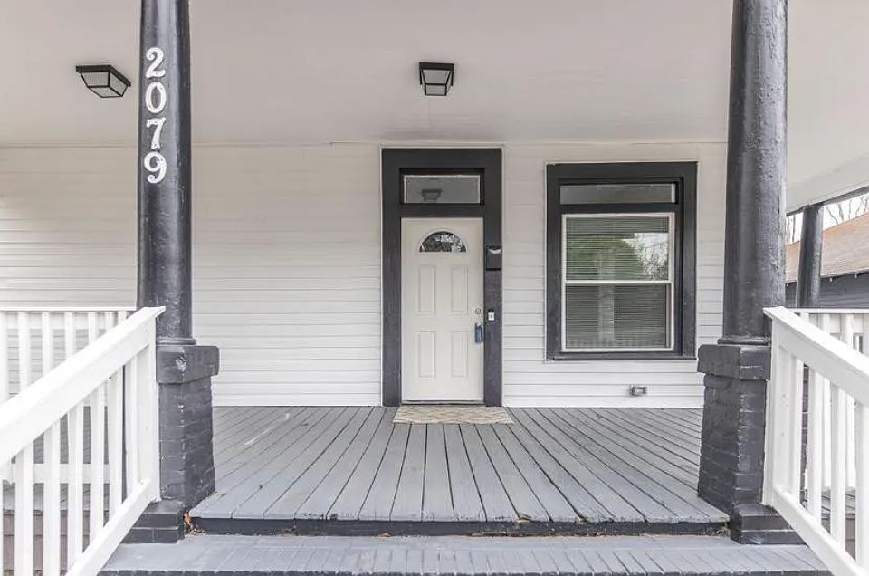 Welcome Home! Front entrance with wrap-around porch