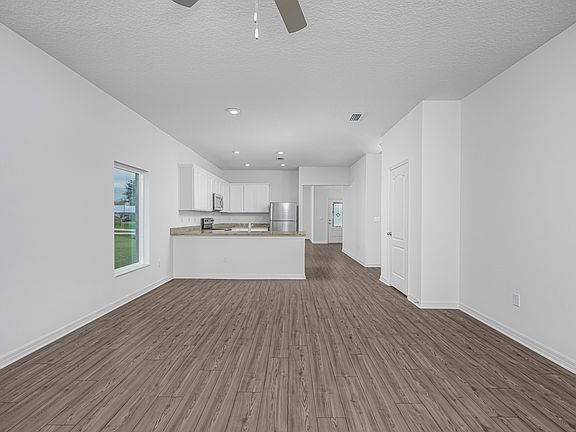 The kitchen overlooks the family room