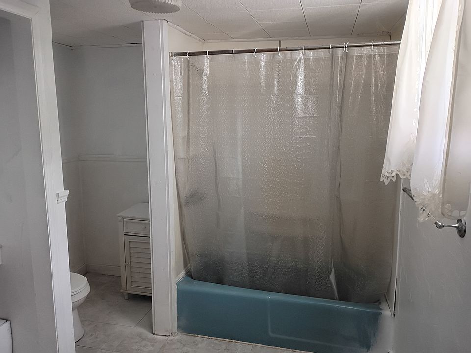 Bathroom, tub, and toilet area