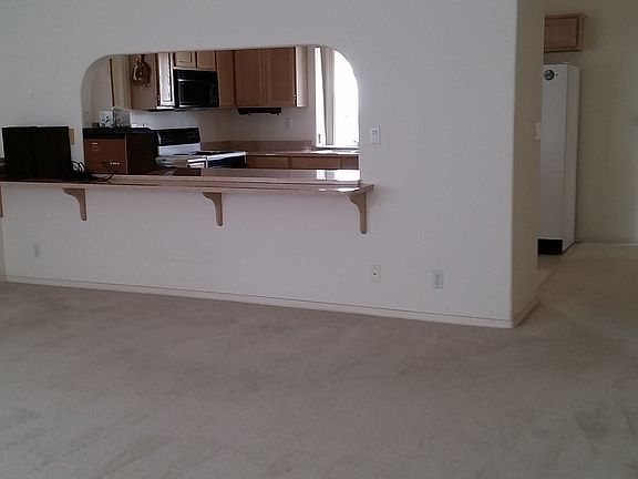 LR facing open kitchen