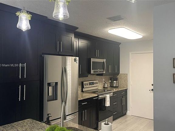 2nd image of 10138 Royal Palm Blvd #1