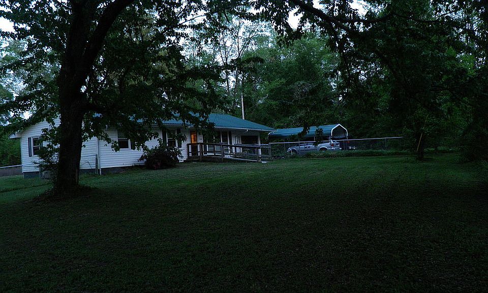 Front of House with Carport 