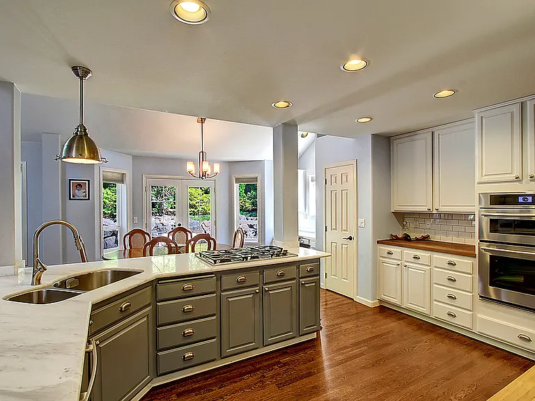 Kitchen with marble counters