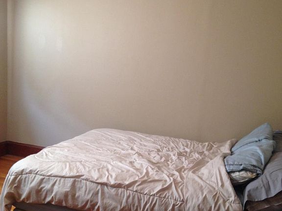 Room comes unfurnished - but queen size bed is pictured to s