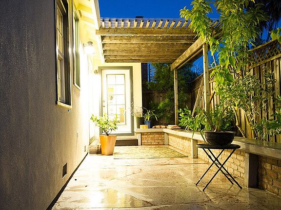 South west-facing patio with pergola.