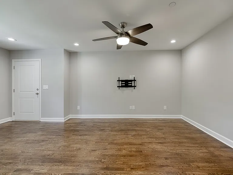 A wall-mounted TV bracket is already installed and ready for your big-screen TV.