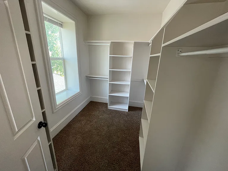 Large walk in closet for second floor bedroom