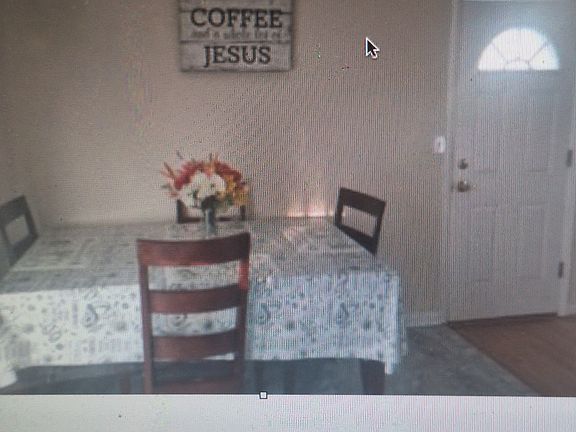 This is the other kitchen area that has a side door leading to the deck and ramp.