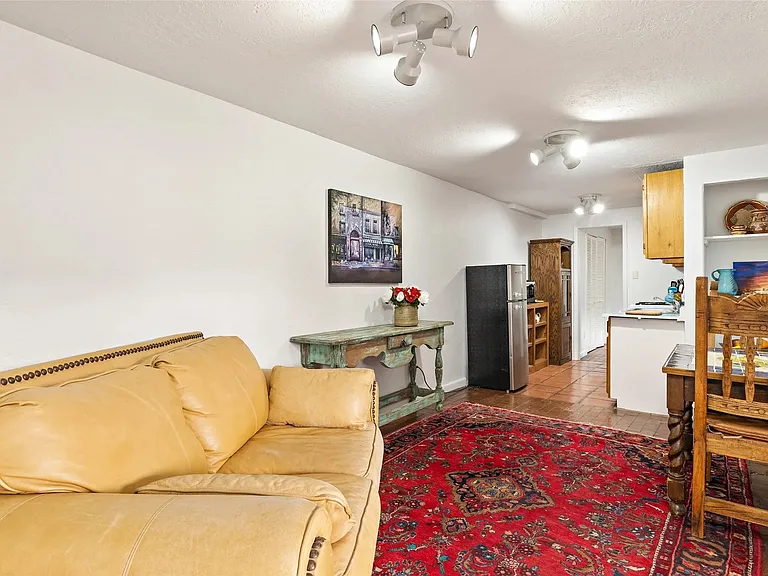 Living and dinning areas looking to kitchen