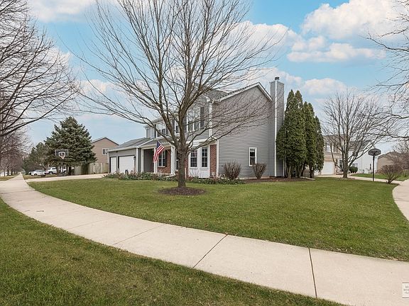 Great corner lot is professionally landscaped.