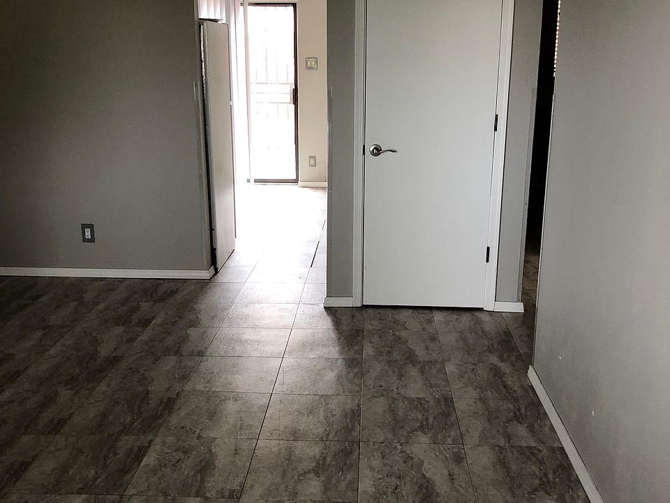 View from front door to back sliding door.