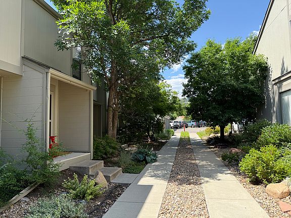 Lovely mature landscaping well maintained by the HOA